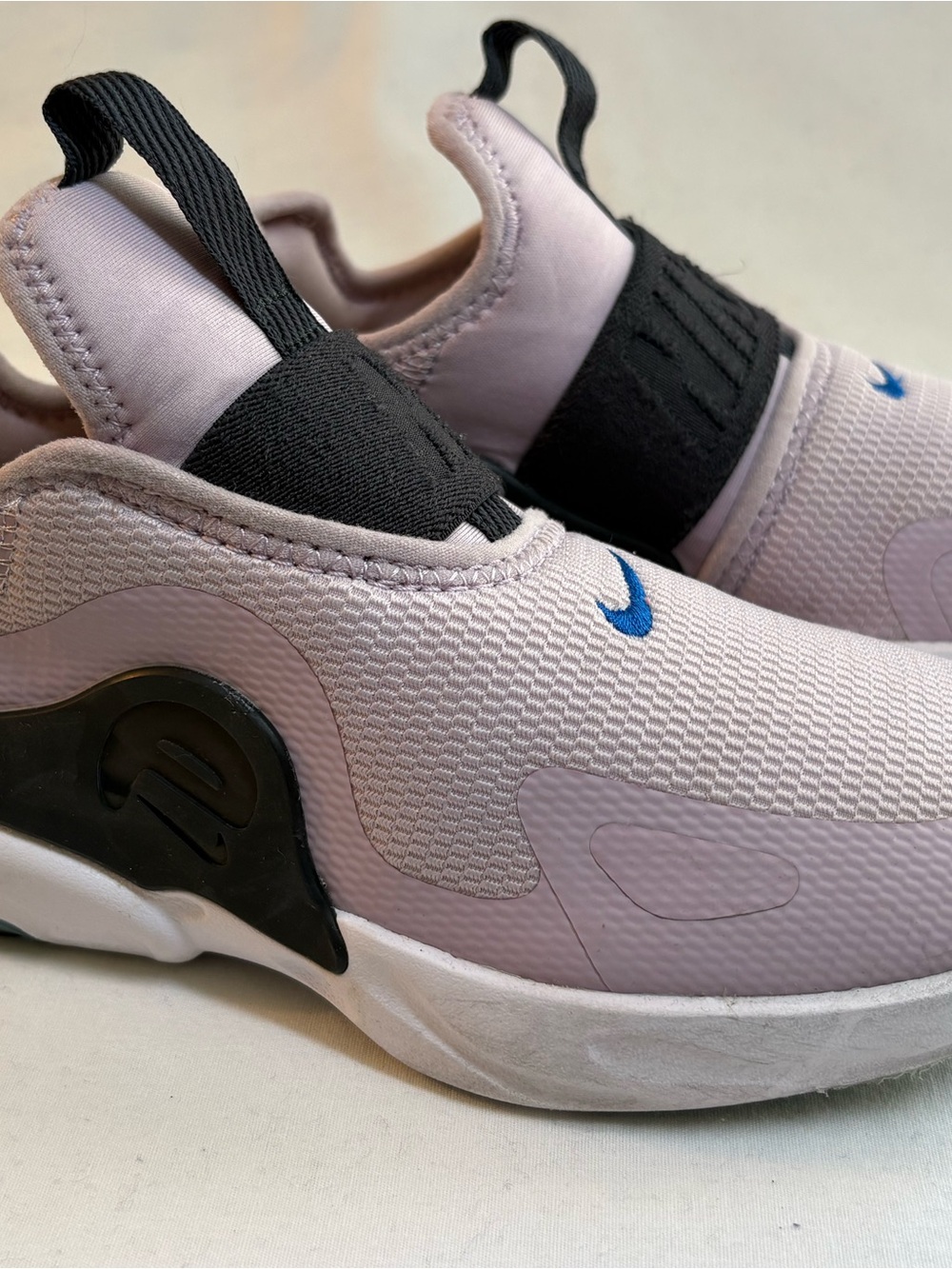 Nike Kids Slip-On Sneakers in Light Pink with Blue Swoosh